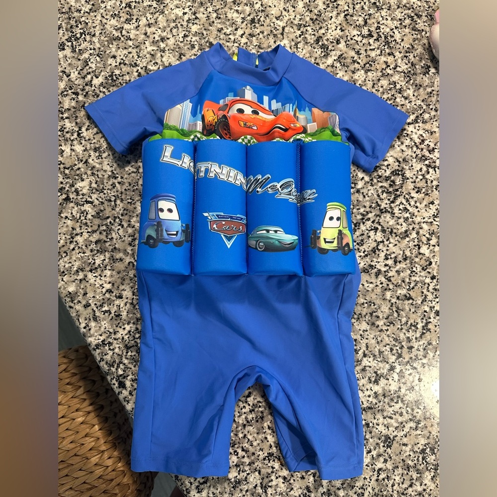 The Floatee with UV Protection NEVER WORN size xl 3T-4T (33-44lbs) Disney CARS!